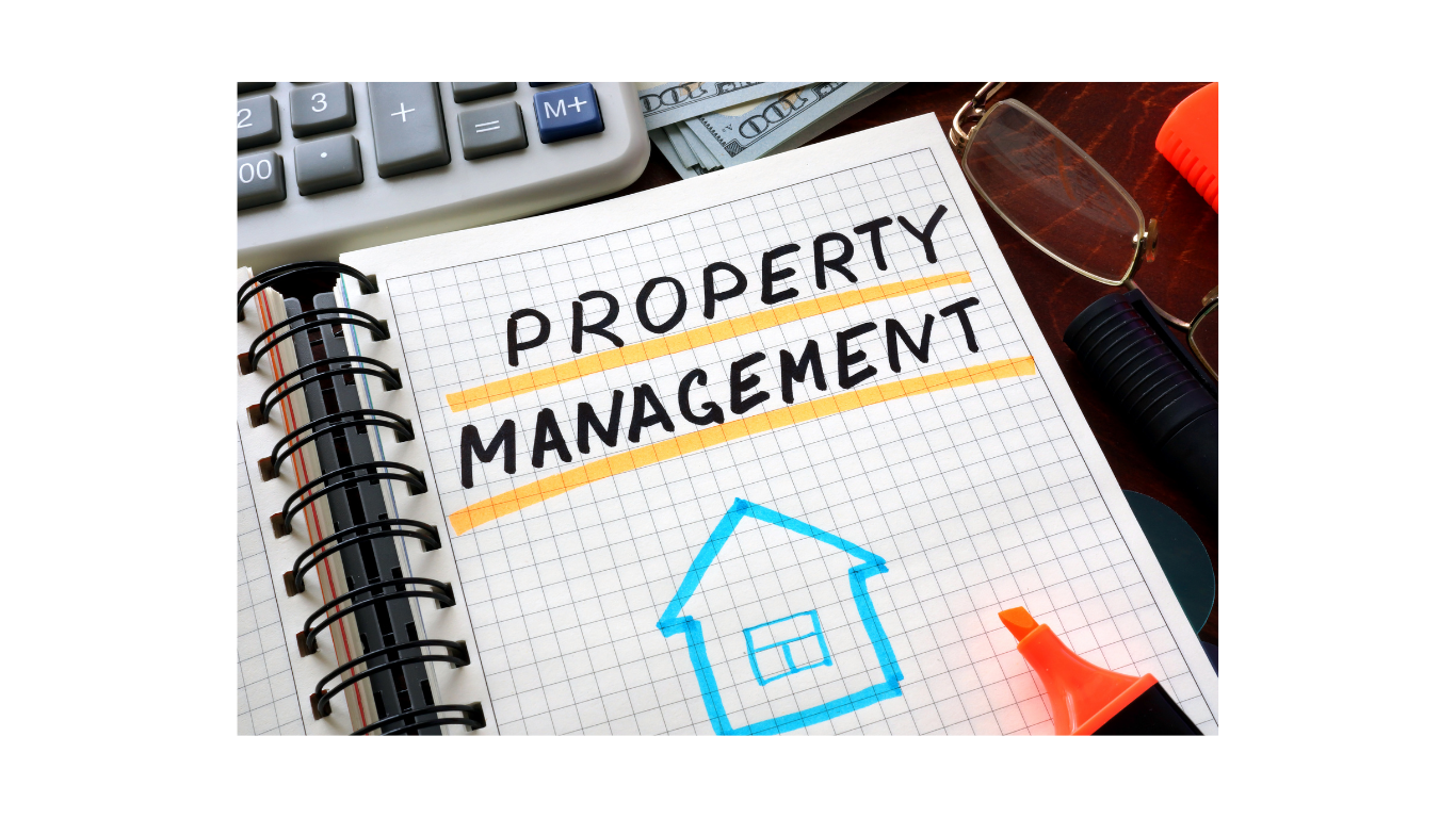 Notebook page with the words 'PROPERTY MANAGEMENT' written in bold, with orange underlines, a simple blue house drawing, and various office supplies around it.