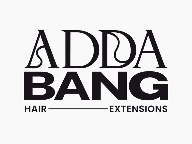 Logo for Adela Bang Hair Extensions featuring the business name in large, bold letters with a tagline underneath.