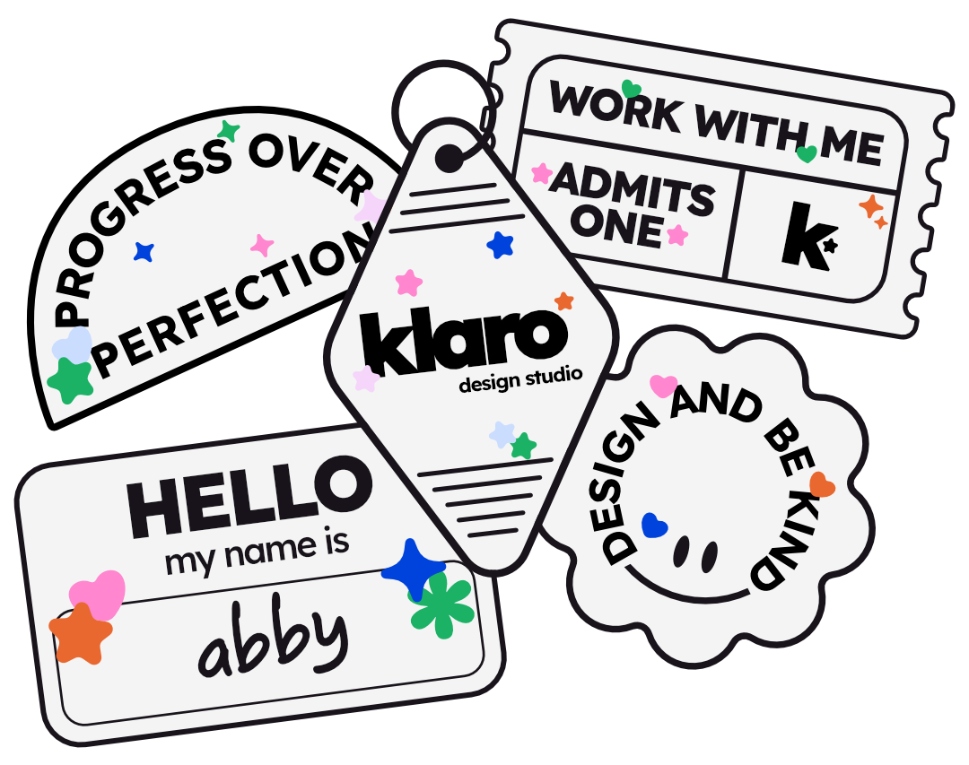 Collection of colorful name tags and a ticket with motivational phrases, featuring the name 'Abby' and various decorative stars and hearts.