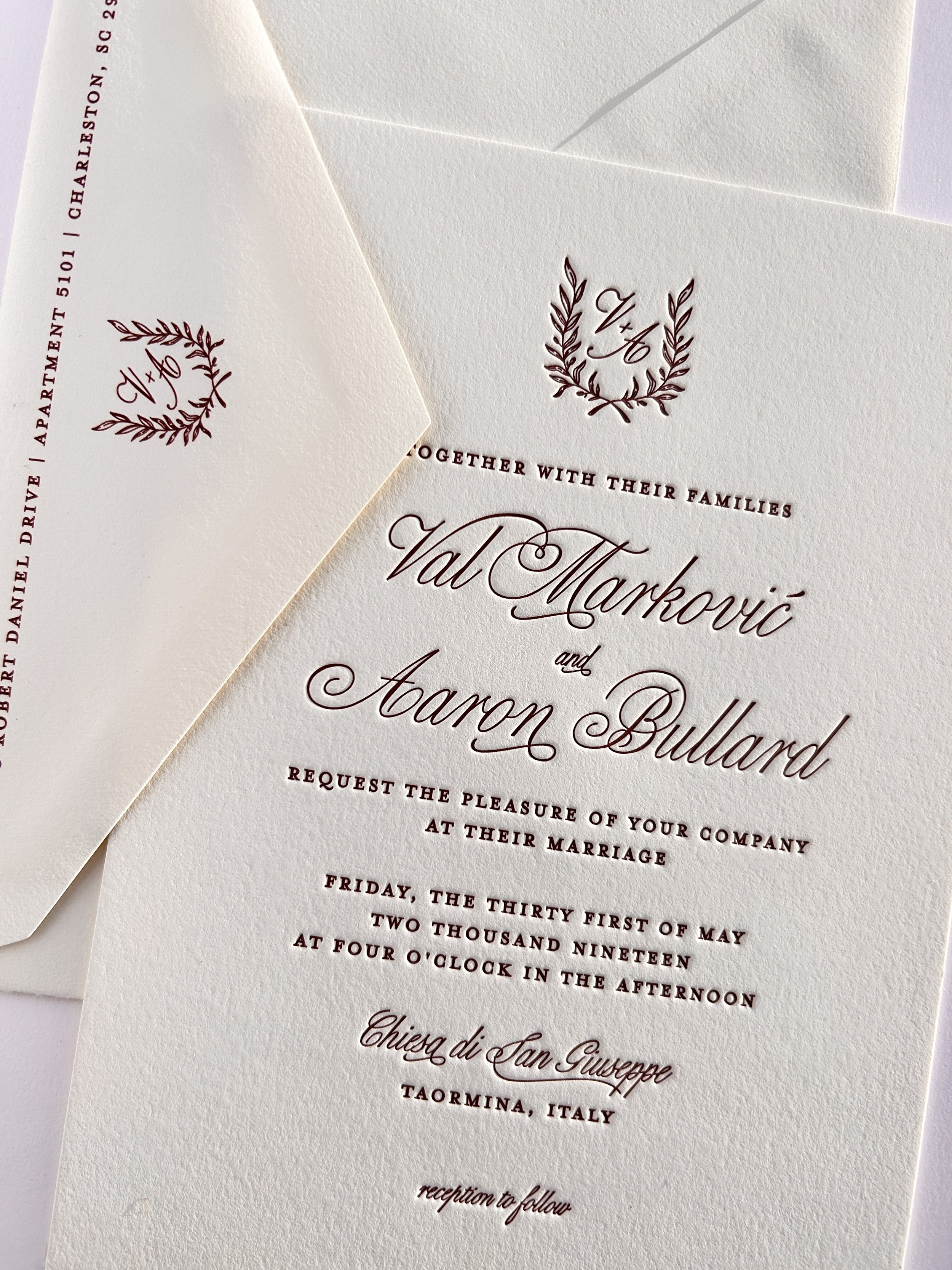 Wedding invitation with elegant script and floral designs for Val Marković and Aaron Bullard wedding details in Italy.