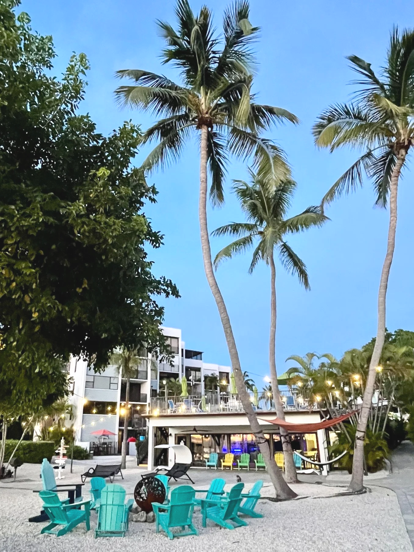 Enjoy the outdoor fire pit at Moon Bay in Key Largo, along with a heated pool, marina, beach, kayaks, pickleball courts, and other resort-style amenities on Blackwater Sound.