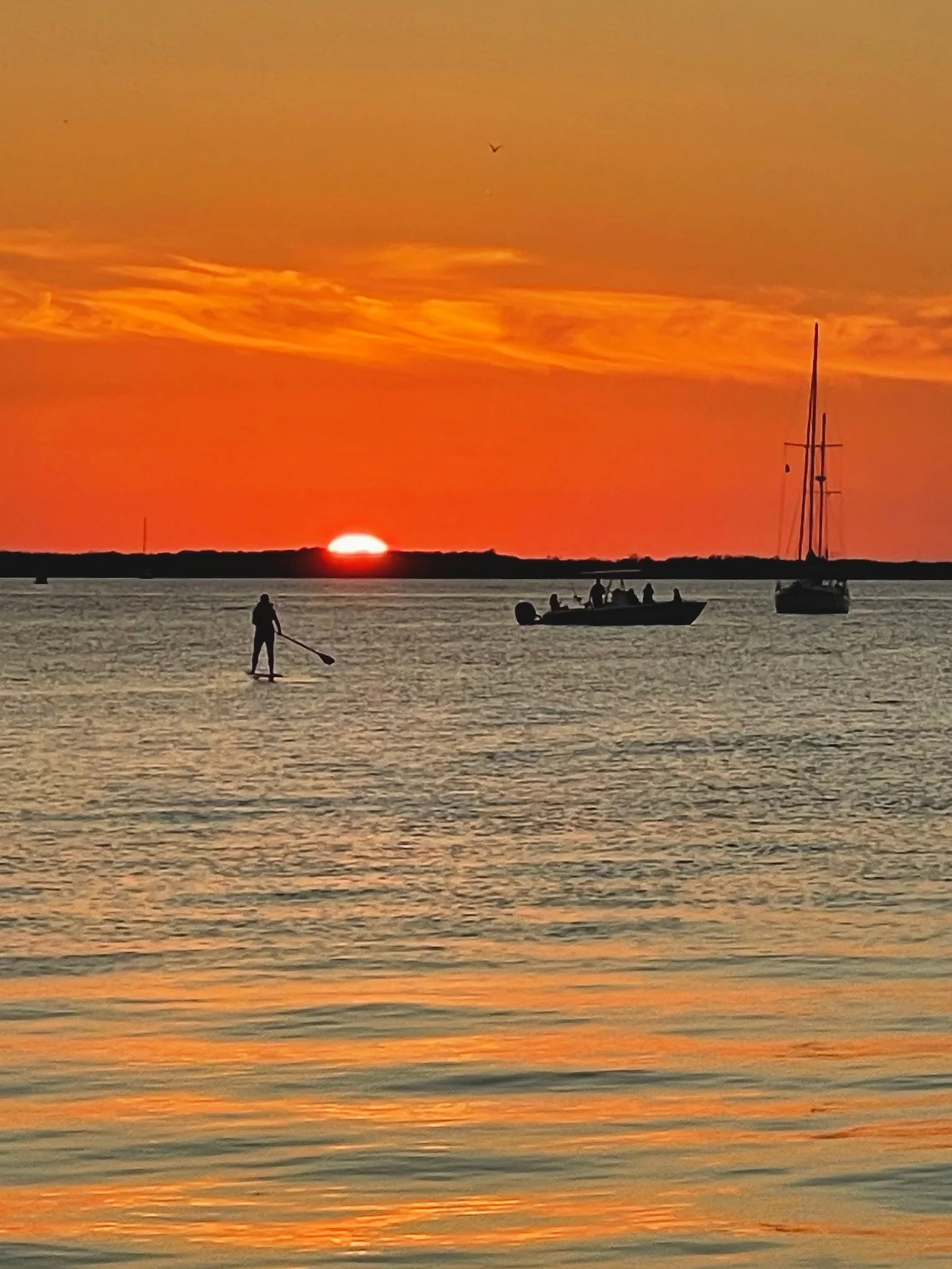 Paddleboarding at sunset.jpg