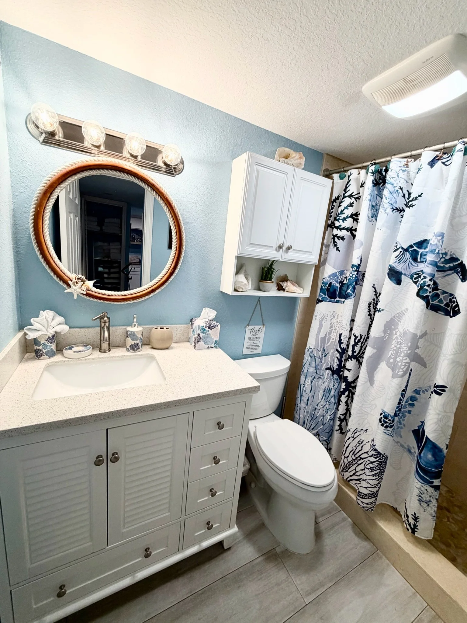 Our remodeled full bathroom features a spacious shower, modern fixtures, soft towels, and thoughtful amenities to make your stay at our Moon Bay Key Largo vacation rental comfortable and convenient.