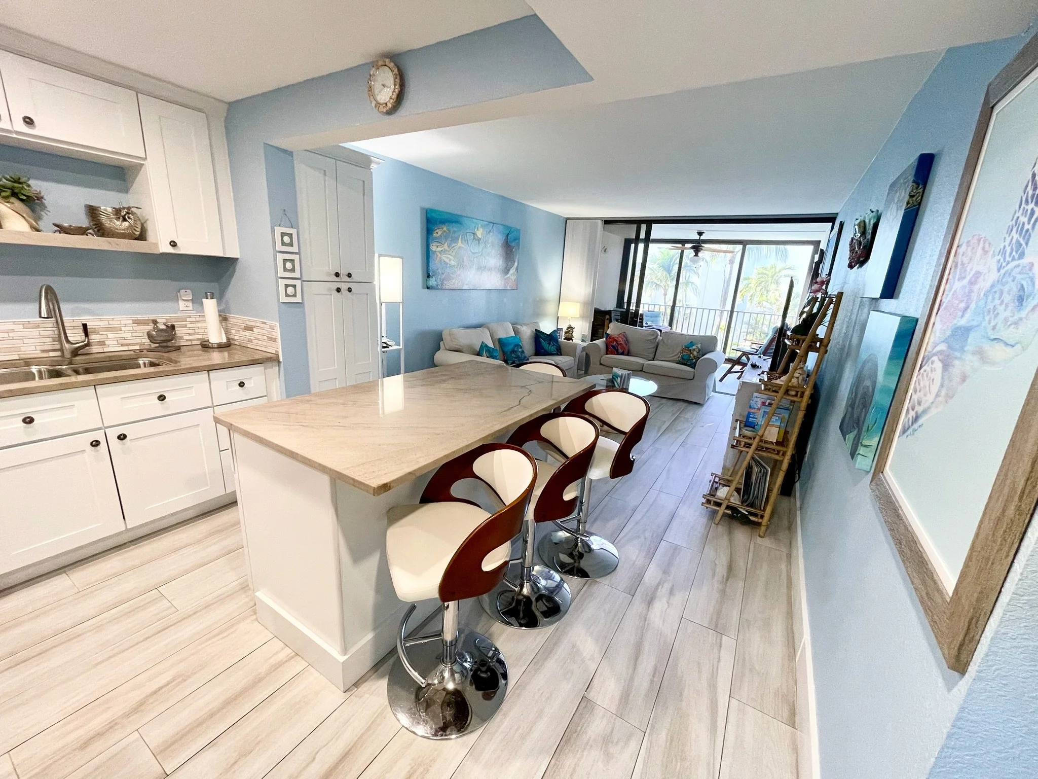 Enjoy a beautifully remodeled kitchen at our Moon Bay Key Largo vacation rental, complete with a coffee bar, wine refrigerator, modern appliances, and everything you need to prepare meals during your Florida Keys getaway.