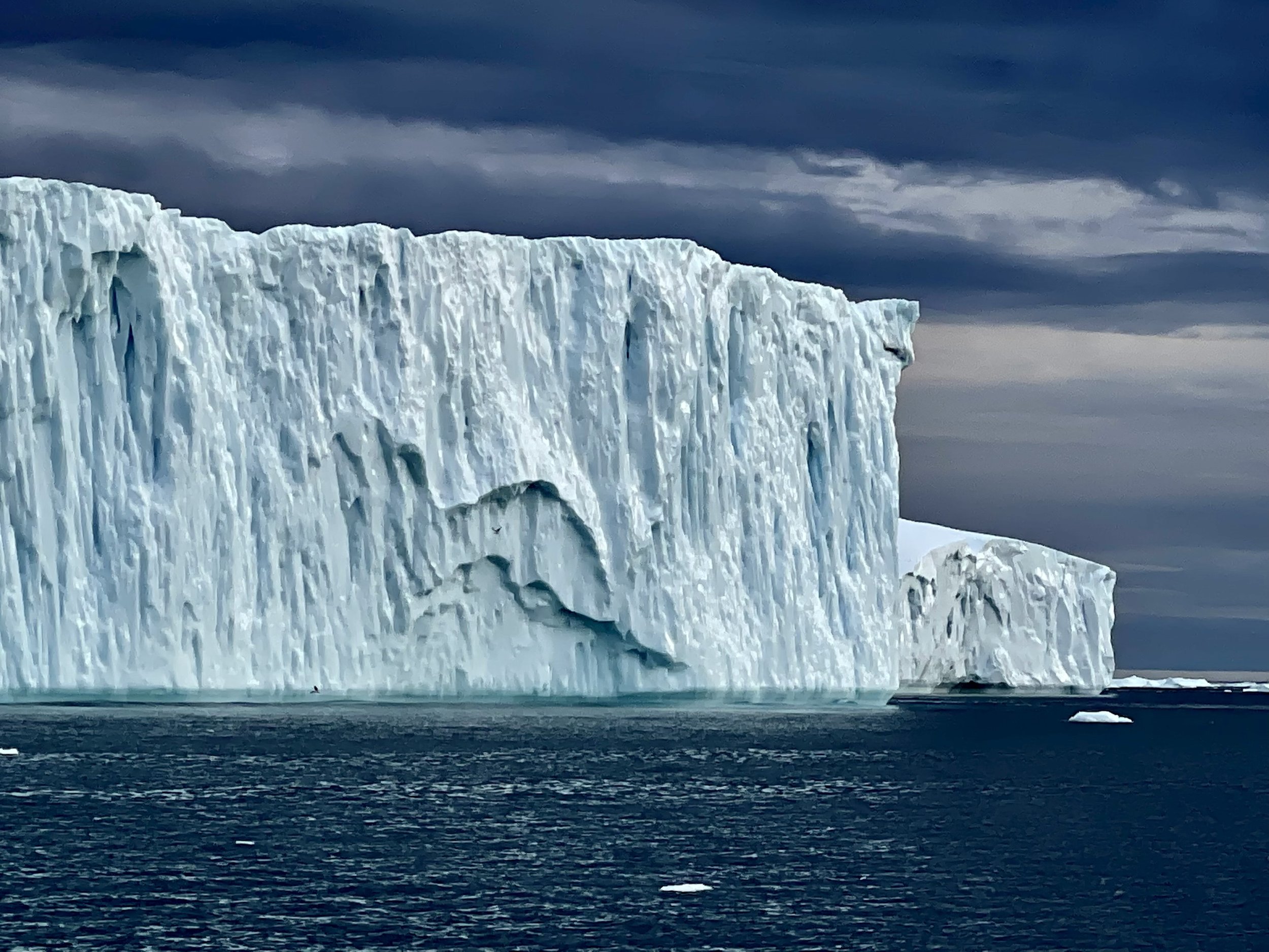 Towering above the waters of Ilulissat Icefjord, this massive iceberg is a humbling reminder of nature's incredible power and beauty. 💙

Floating silently after breaking away from one of the world's fastest-moving glaciers, these giants have spent y