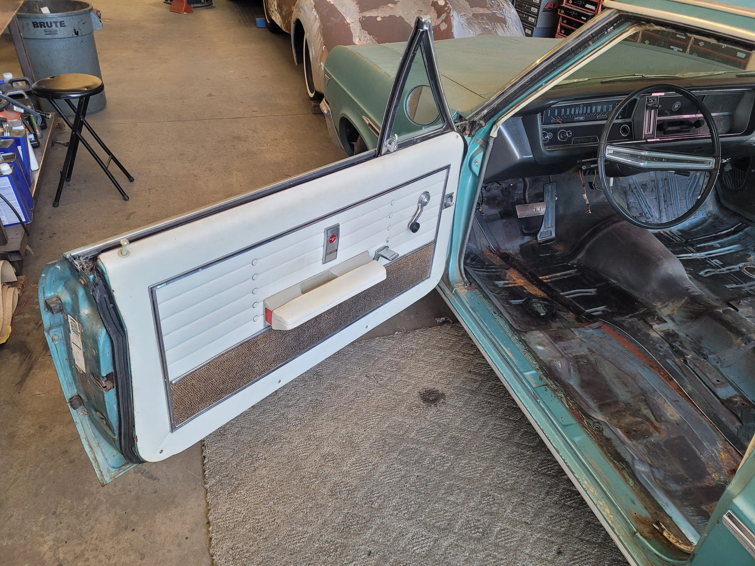 Dig this cool make over! Our Skylark originally came with black carpet on the floor and the bottom of the door panels. The carpet was trash and the door panels were horribly faded. Since I plan on putting in a new Turquoise carpet (to match the exter
