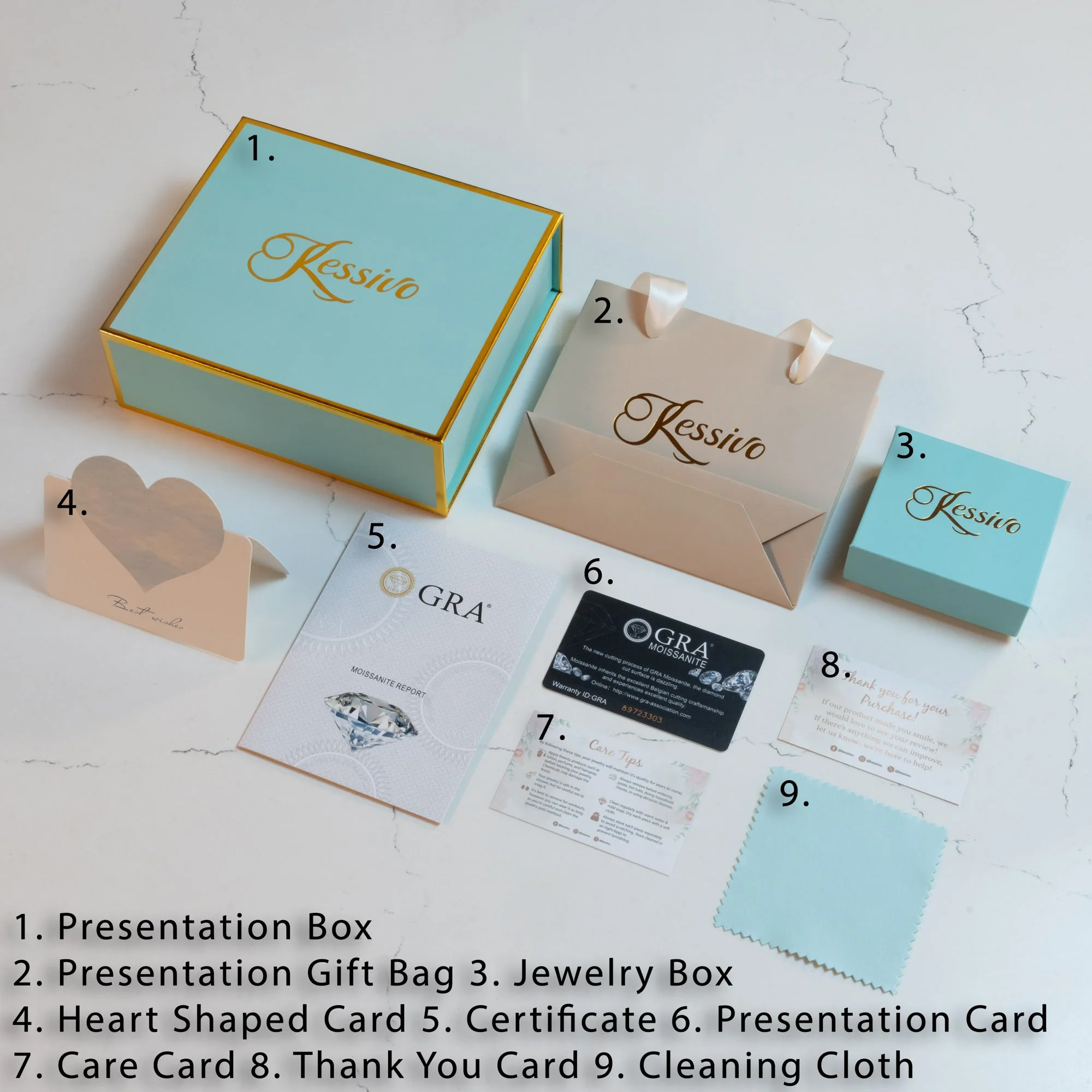 Light blue and white jewelry presentation box, a gift bag, a jewelry box, a heart-shaped card, a certificate, a presentation card, a care card, a thank you card, and a cleaning cloth arranged on a white surface, labeled with descriptions.