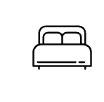 Lit simple avec deux oreillers.