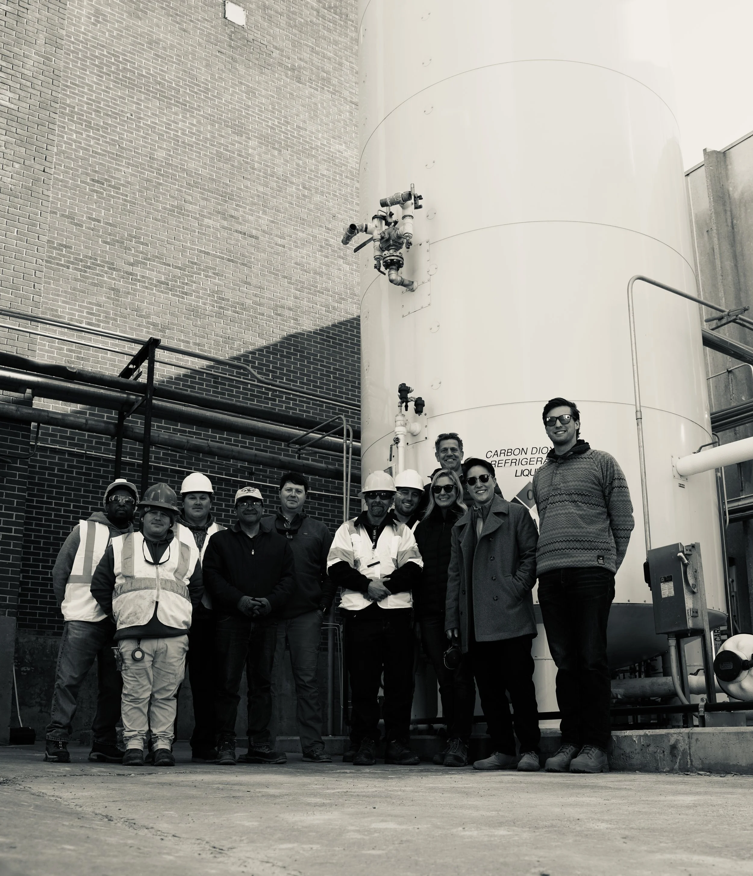 The entire CleanCycle Carbon, Perdue, and GreenGas team's at the Perdue Lewiston facility after a successful delivery.