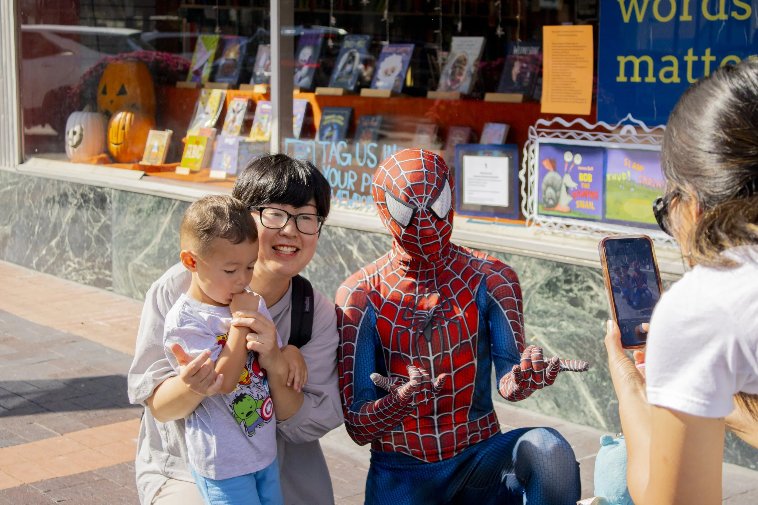 In my community service club, we often visit community events where I get to take photos of children meeting their childhood heroes. It's the best way to spend a weekend!