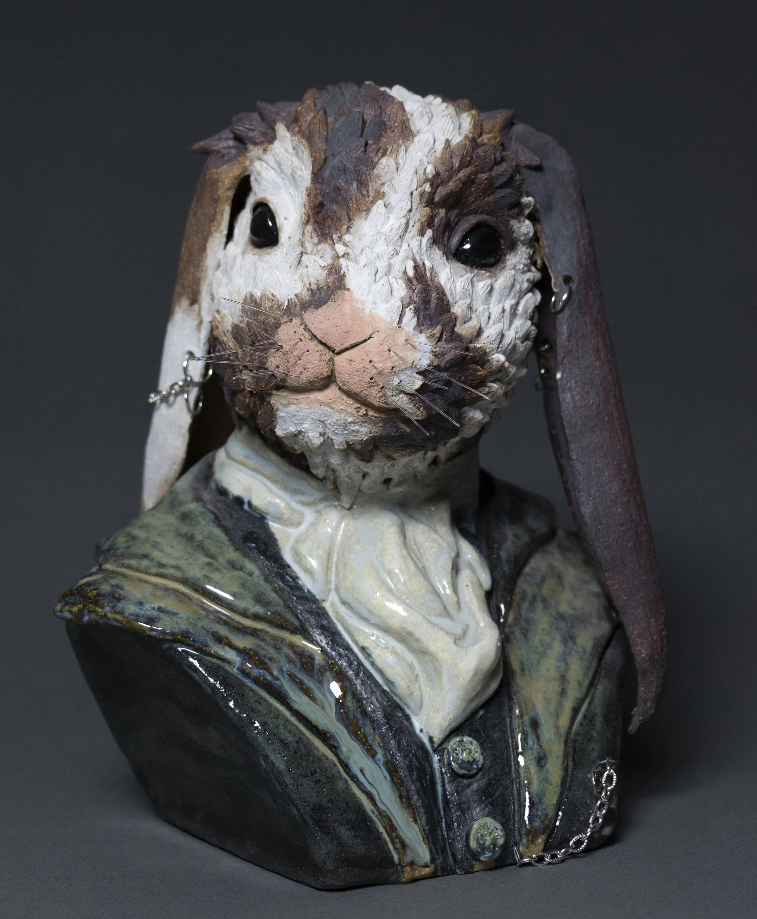 Whiskers, 2025. ceramic and mixed media 13''x7''x6''