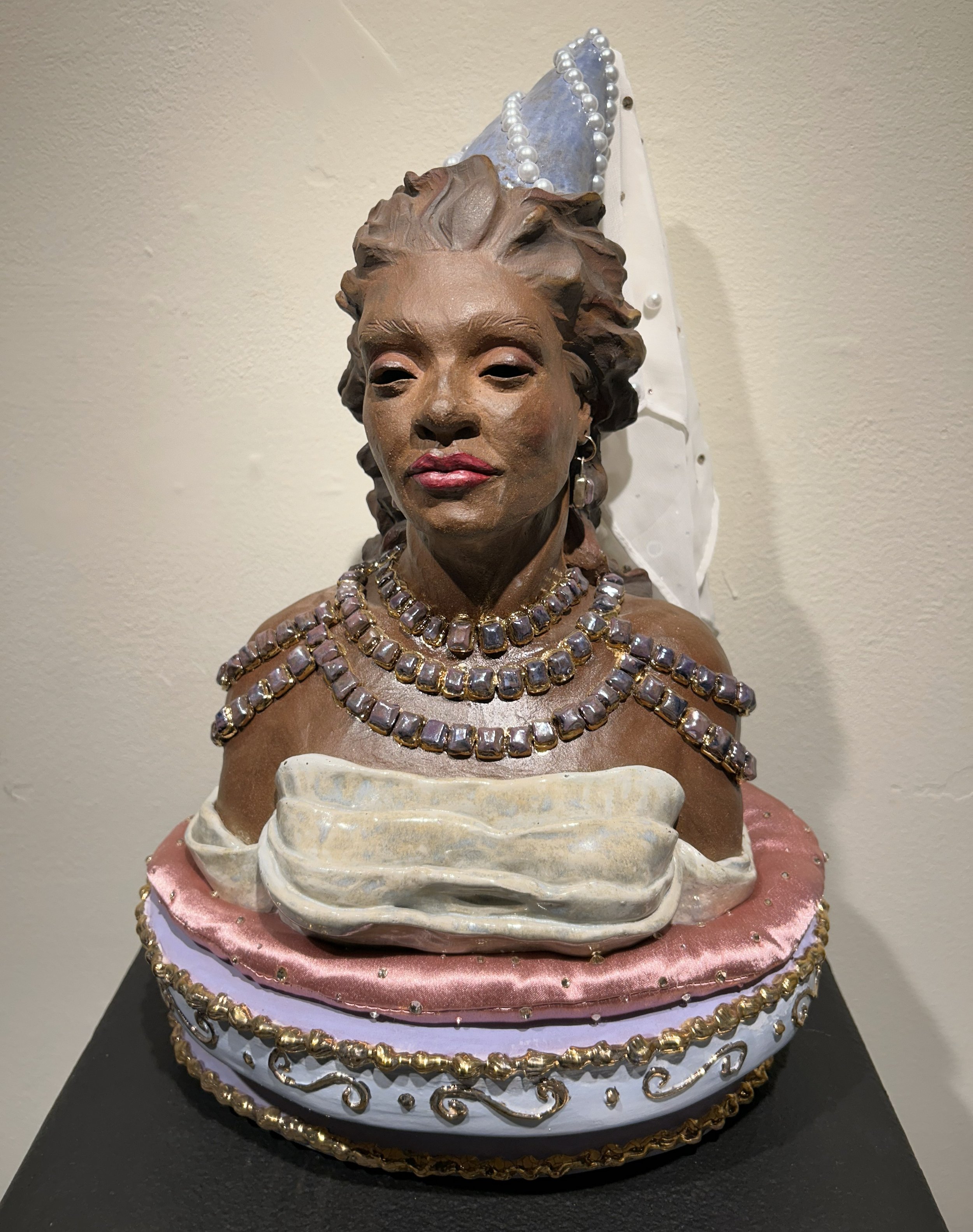 Princess of Pillows, 2025. Ceramic and mixed media 17''x10''x9''