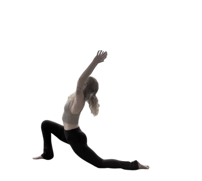 A woman practicing yoga in a low lunge pose with arms extended overhead.