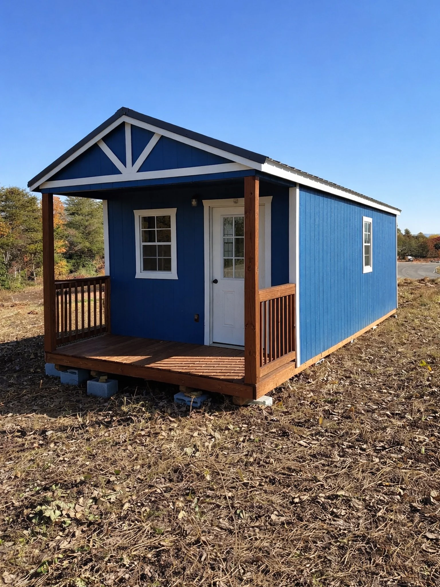 12 x 32 foot Blue Barn
$37,900.00
This project showcases a 12 x 32 ft shed converted into a finished interior space. It features a tall gabled ceiling and a full bath. Has a 4 foot porch.