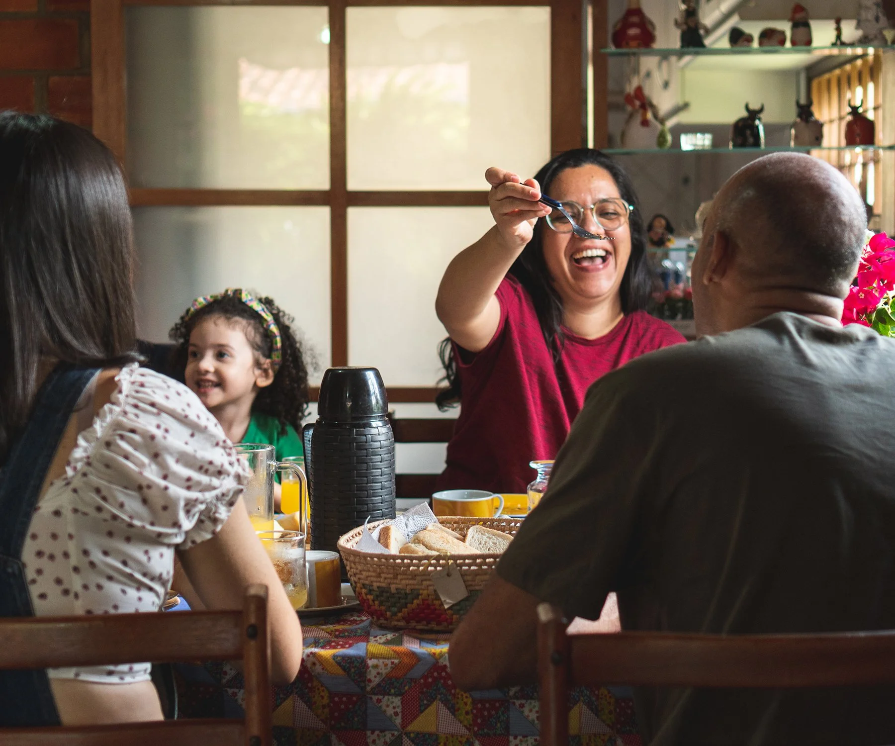 Happy family enjoying a meal together at home