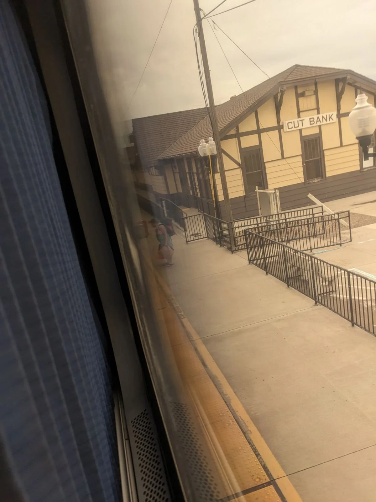 A view from the observation car of Jeremy being evicted from the train at the Cut Bank train station in Cut Bank, Montana.