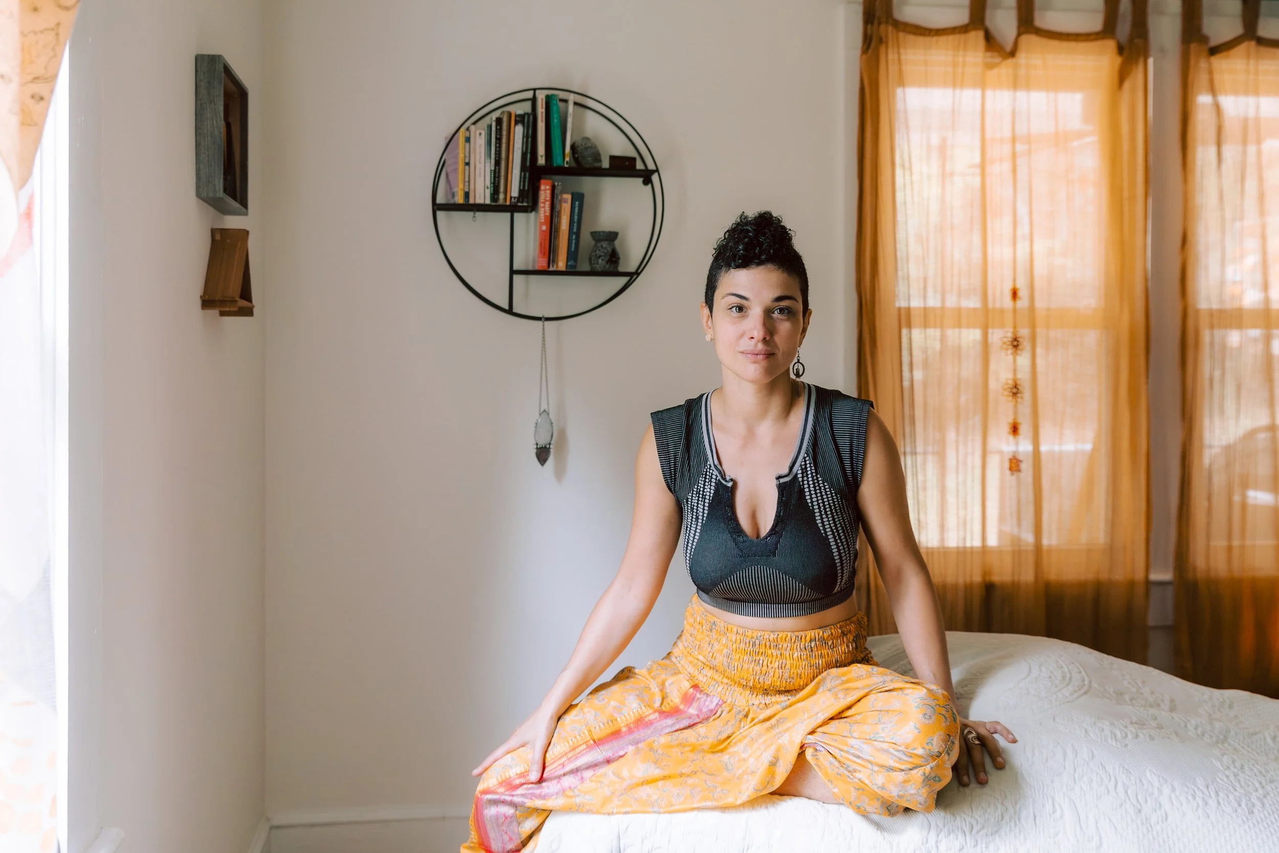 Body and energy specalist sitting in their safe haven in Asheville, NC