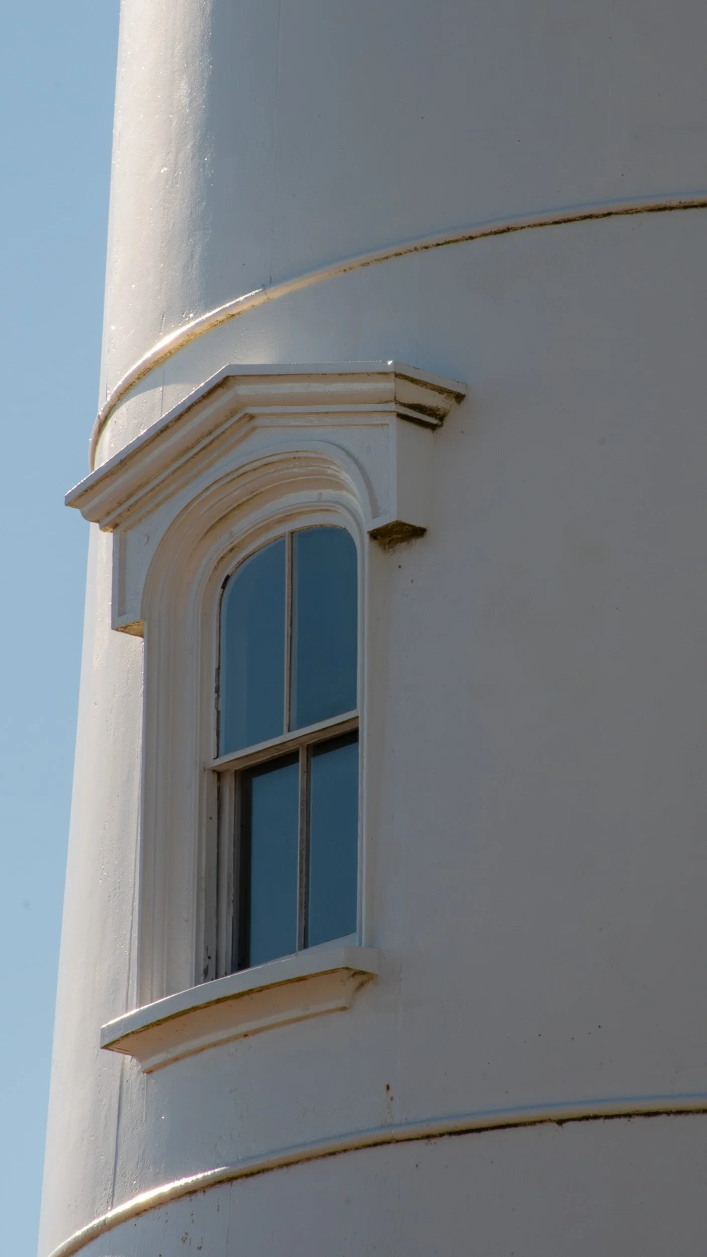 Light enters through structure, shaped by depth and surface.