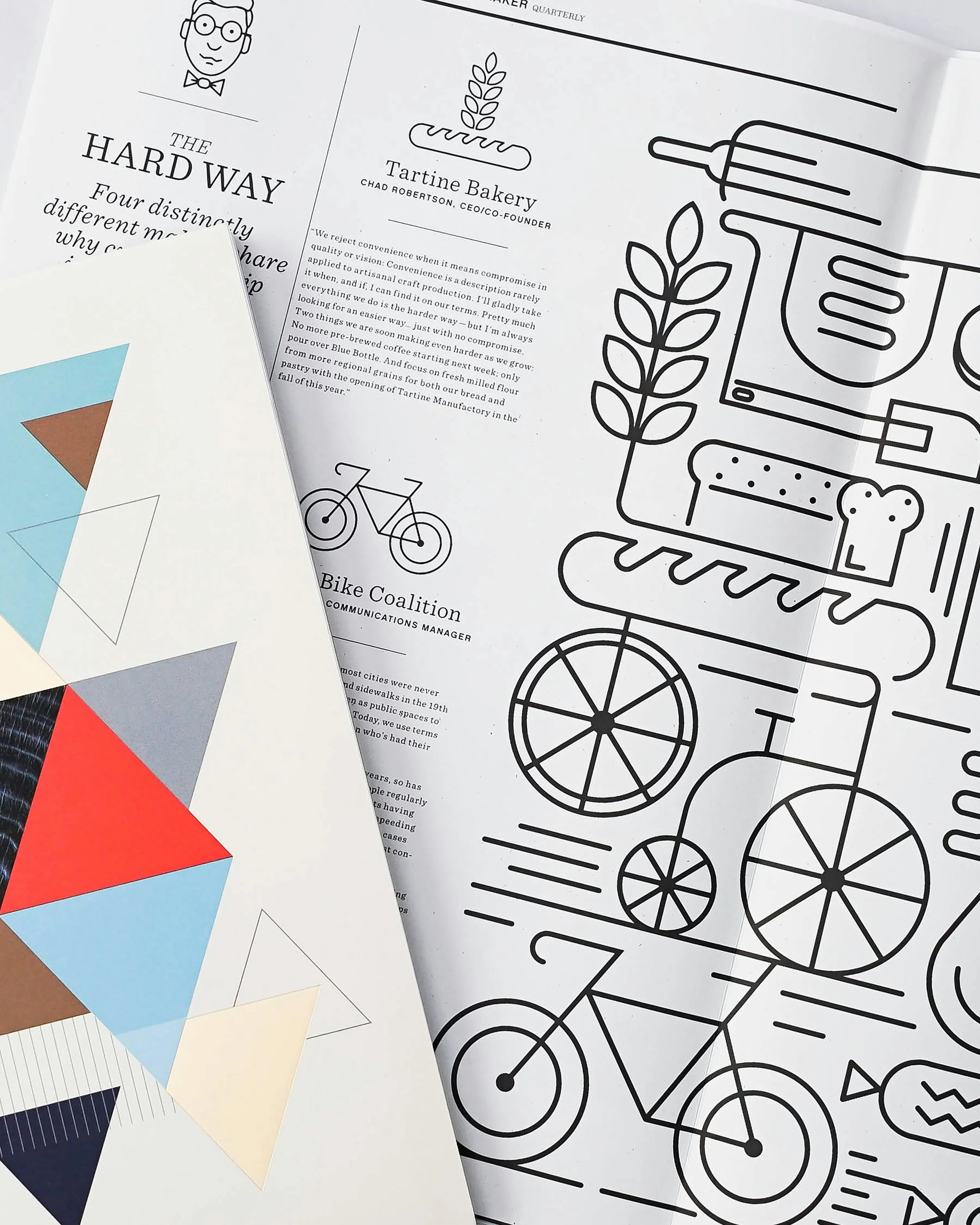 Black and white line art illustration of a kitchen scene with a pot on a stove, a loaf of bread with a bear face, a potted plant, and a bicycle wheel, alongside textual content about the Tartine Bakery and Bike Coalition.