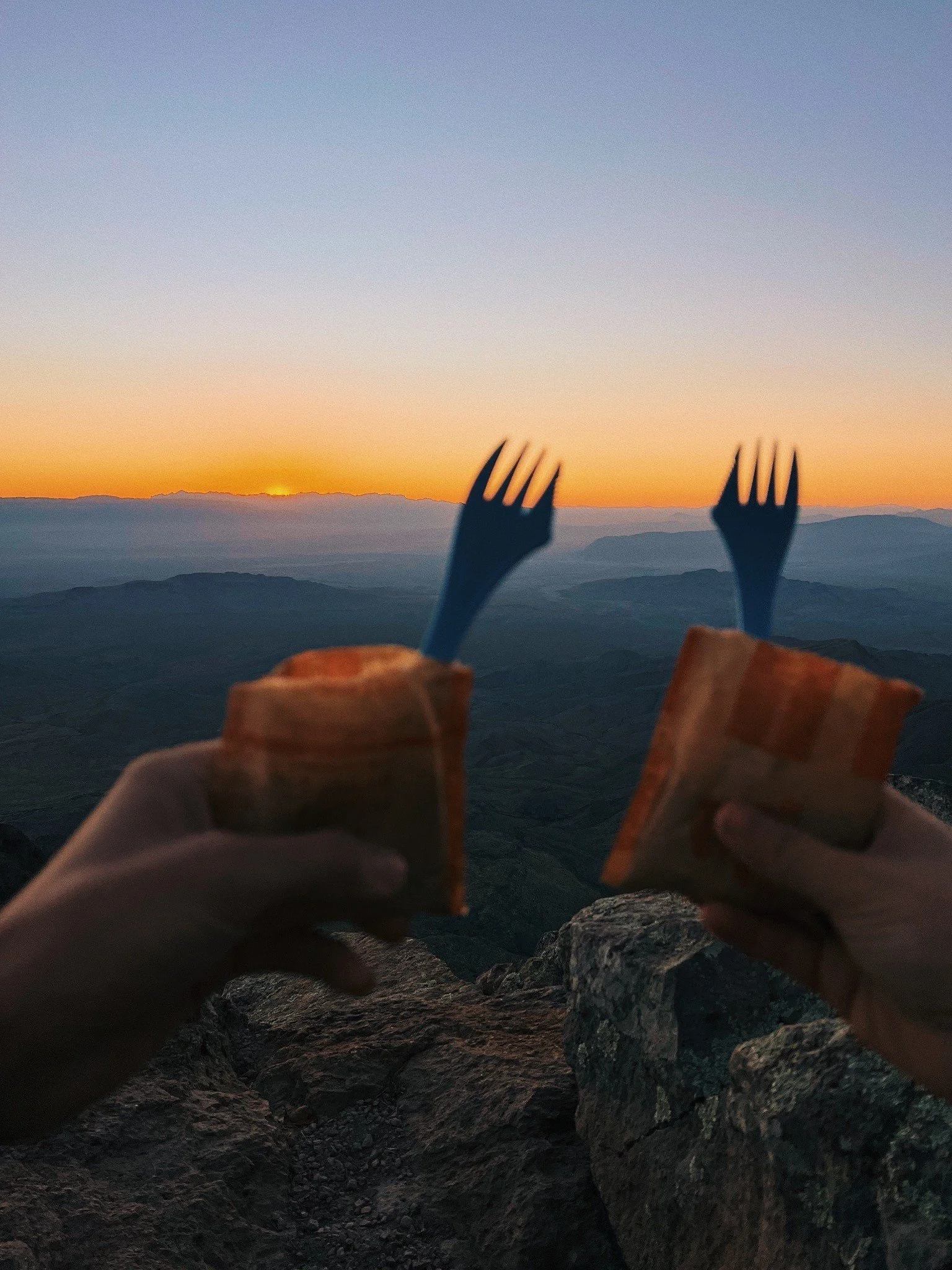 Eating oatmeal at sunrise atop Emory Peak in Big Bend National Park. (Kevin Severin)
