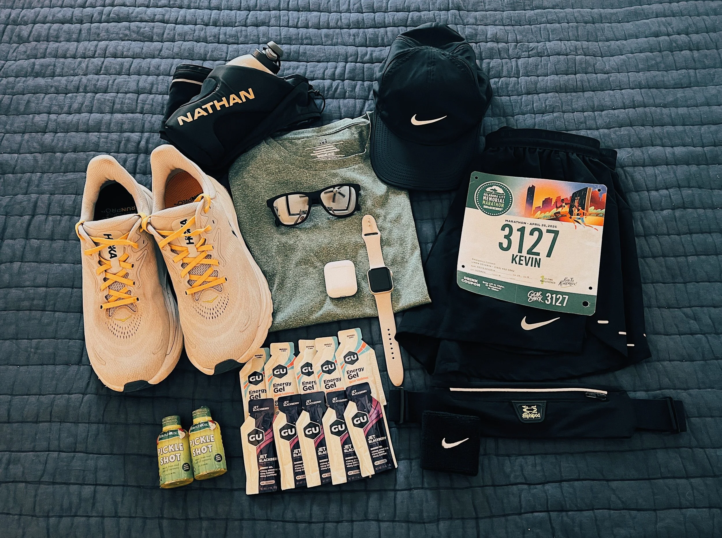 Running gear situated on a bedspread.
