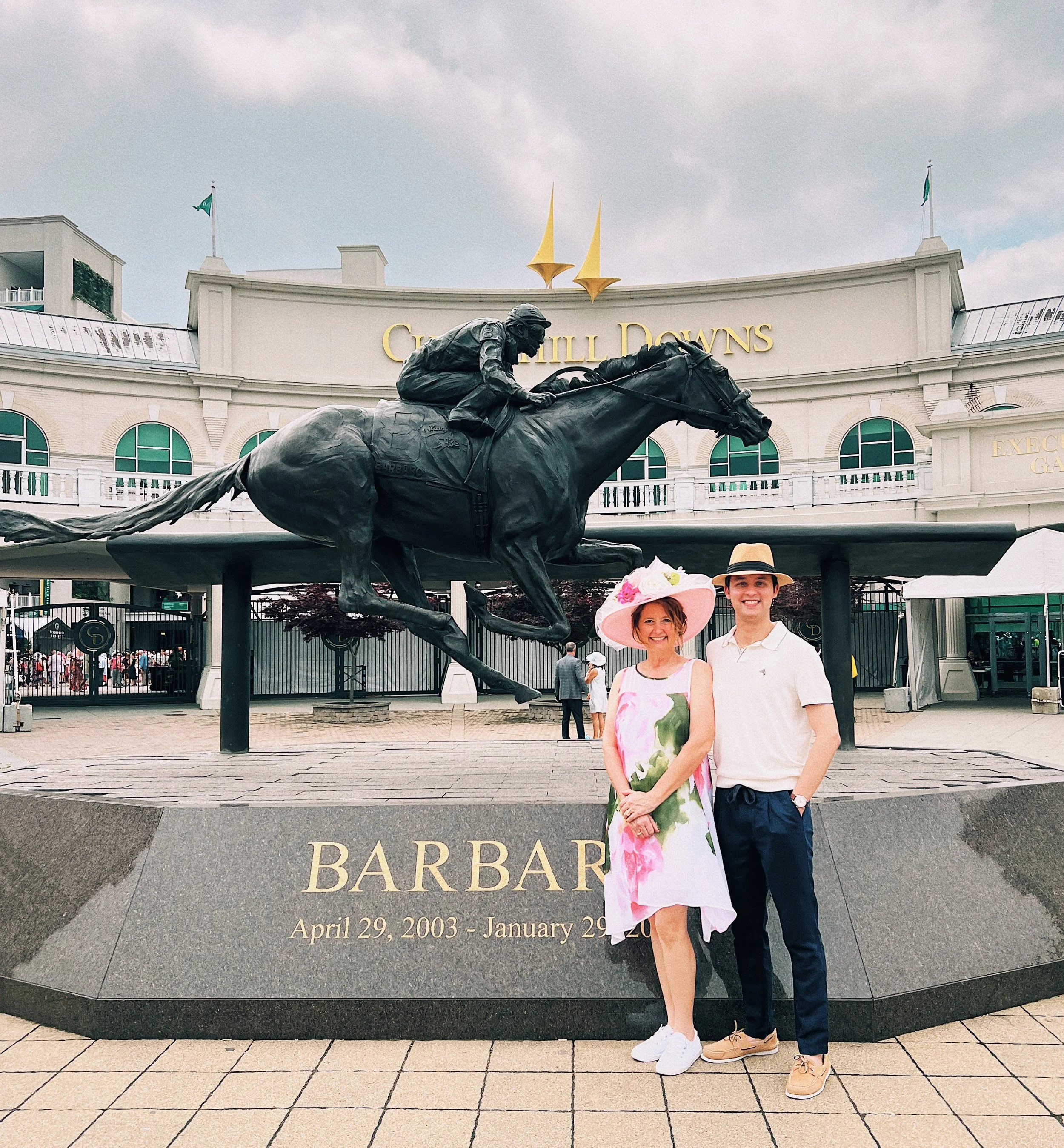 Kevin Severin with his Mom pictured with the statue of Barbaro.