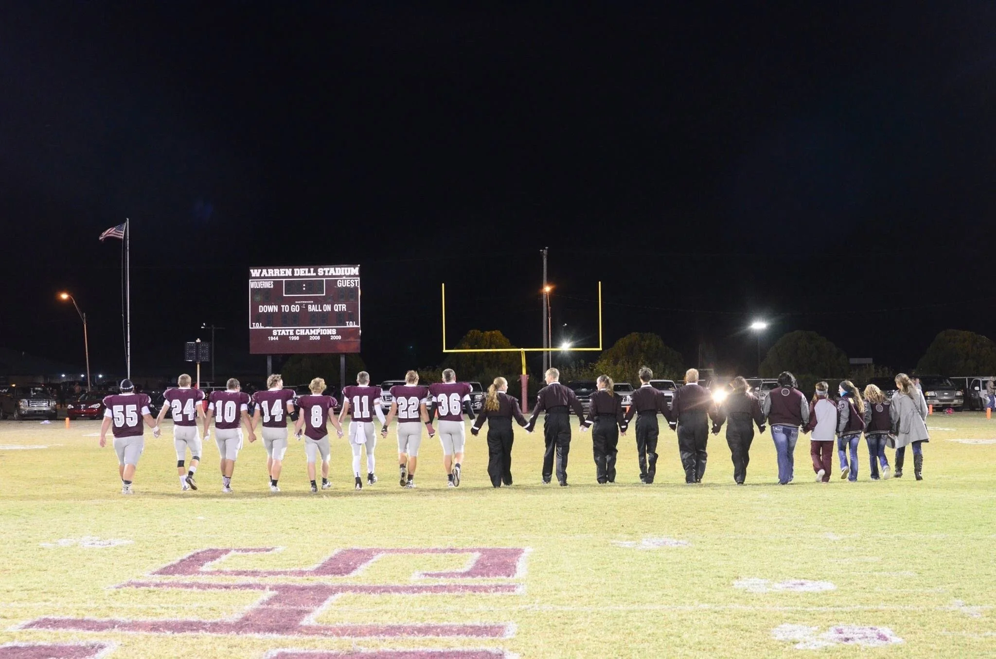 Kevin Severin and his classmates participating in the Senior Walk on Senior Night