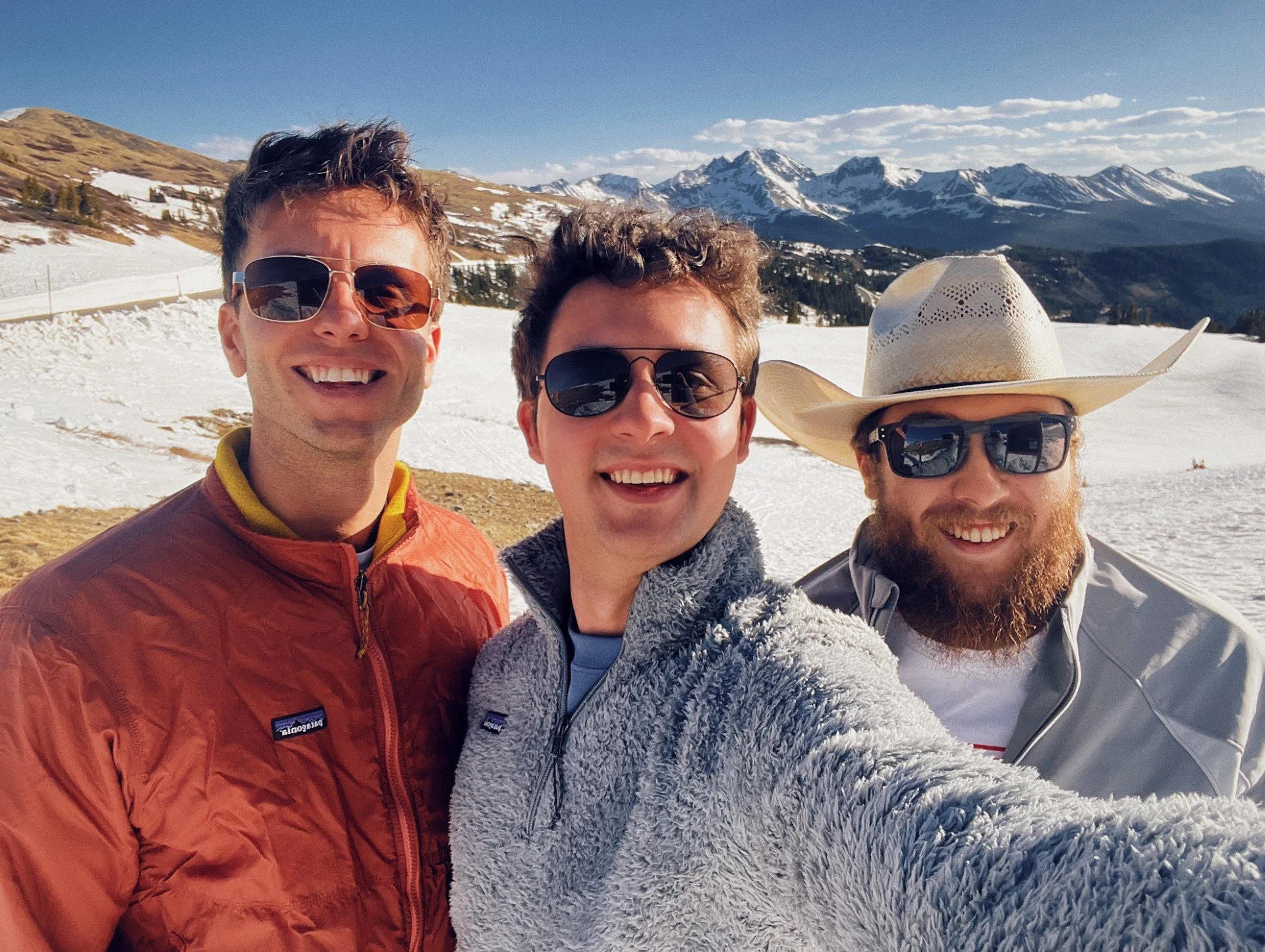Matthias, Kevin and Zak take a photo together in the Rocky Mountains.