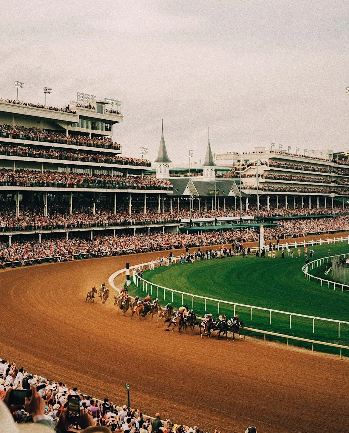Horses reach the first turn of the 150th Running of the Kentucky Derby.