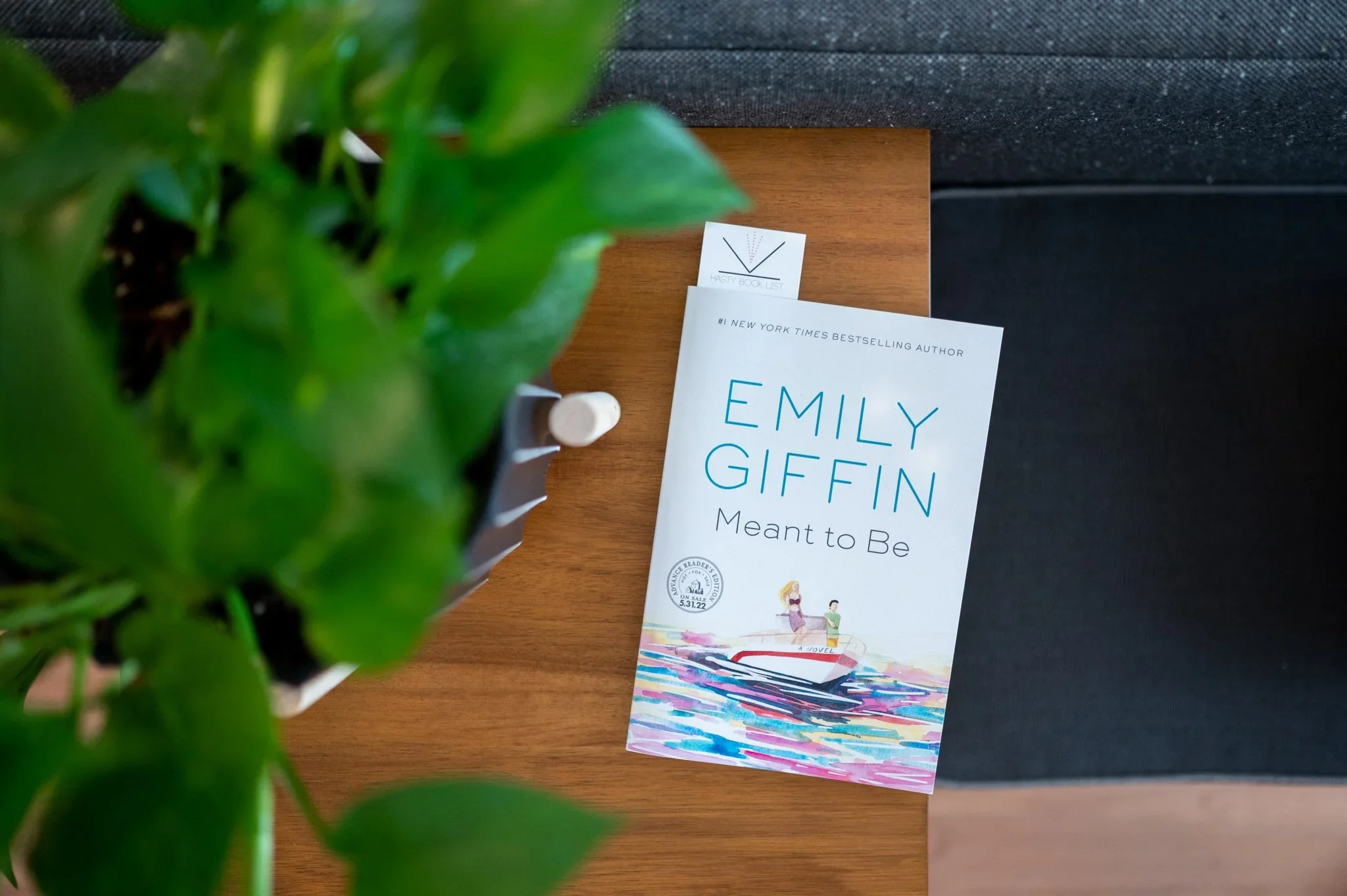 Emily Giffin's Meant to Be lays on a coffee table.