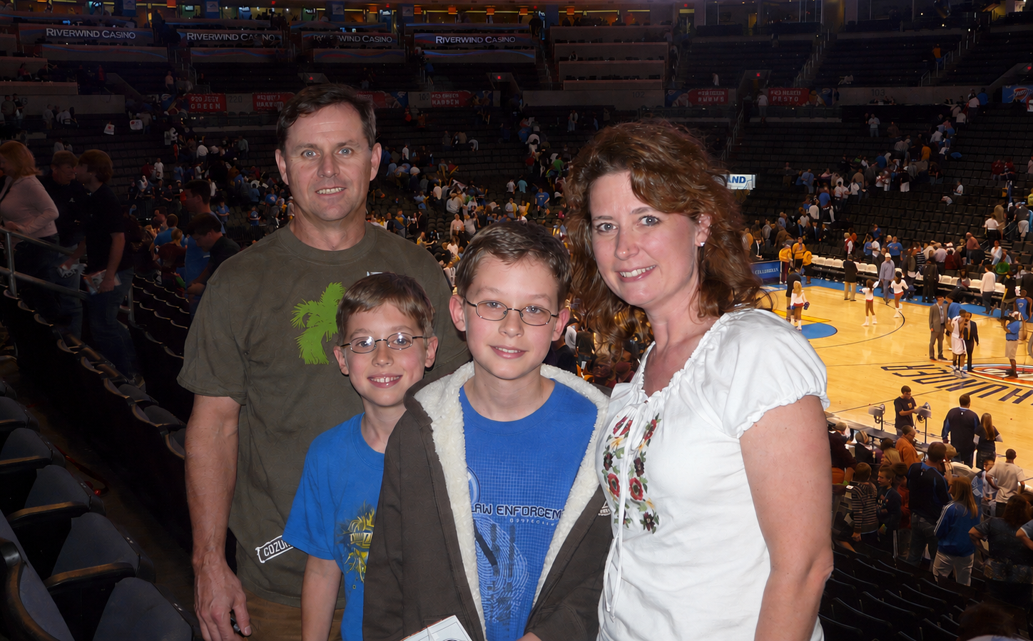 Kevin Severin with his family at an Orlando Magic basketball game at the then Ford Center.