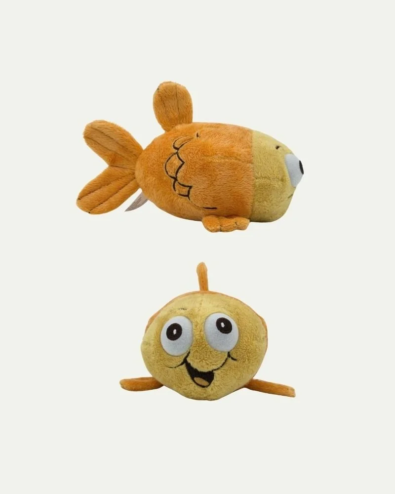 Two plush toys, one resembling a fish and the other a round yellow character with big eyes and a smiling face, against a plain white background.