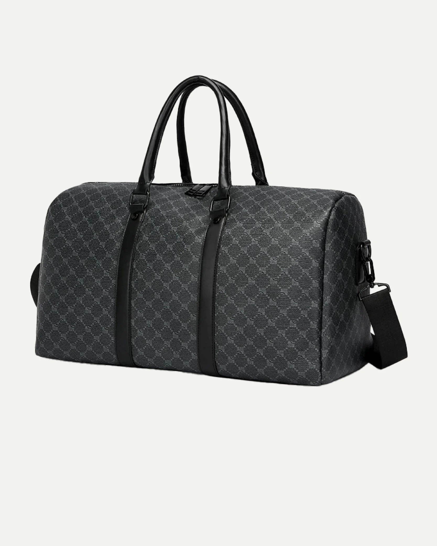 A black and gray patterned duffle bag with leather handles and an adjustable shoulder strap.