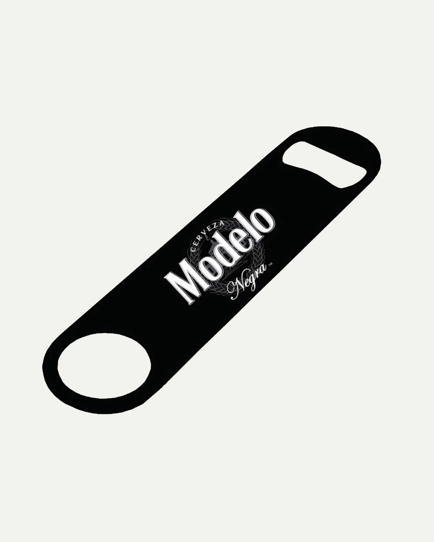 Black bottle opener with Modelo Negra logo in white, elongated shape with rounded ends and a cut-out section for opening bottles.