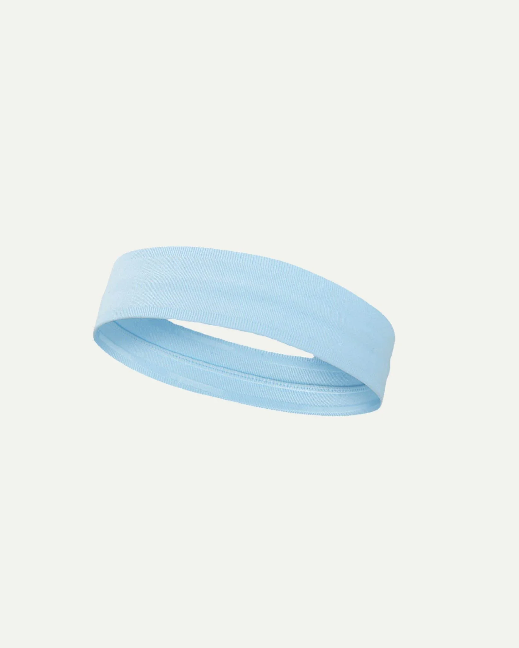 Light blue fabric headband on a plain light background.
