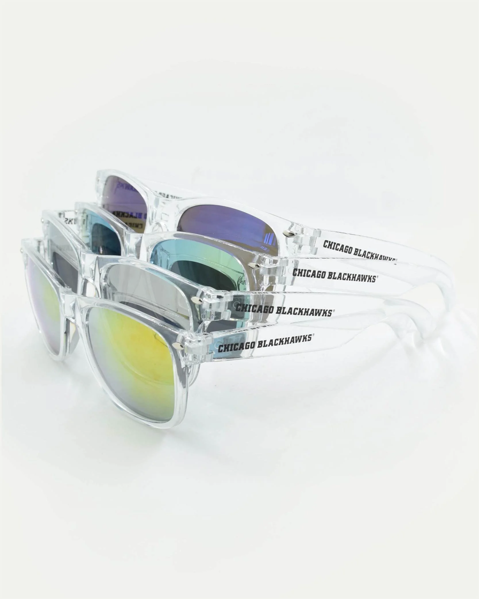 Four pairs of sunglasses with clear frames and different colored lenses, stacked together on a white background, with 'Chicago Blackhawks' logo on the arms.