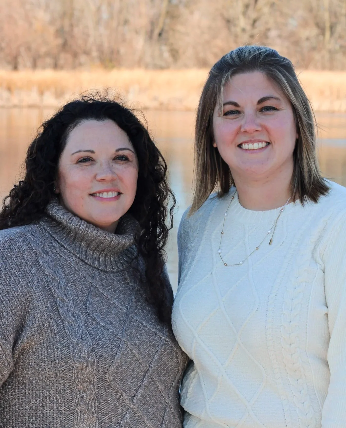 Image of Leina D. Holte, J.D. and Camry M. Fielders, J.D. in the woods