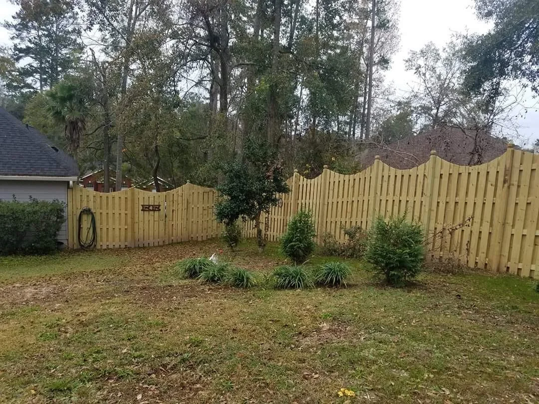 Wooden privacy fence.