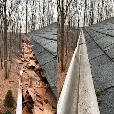 Comparison of a damaged roof edge with peeling shingles on the left and a well-maintained roof edge with intact shingles on the right.