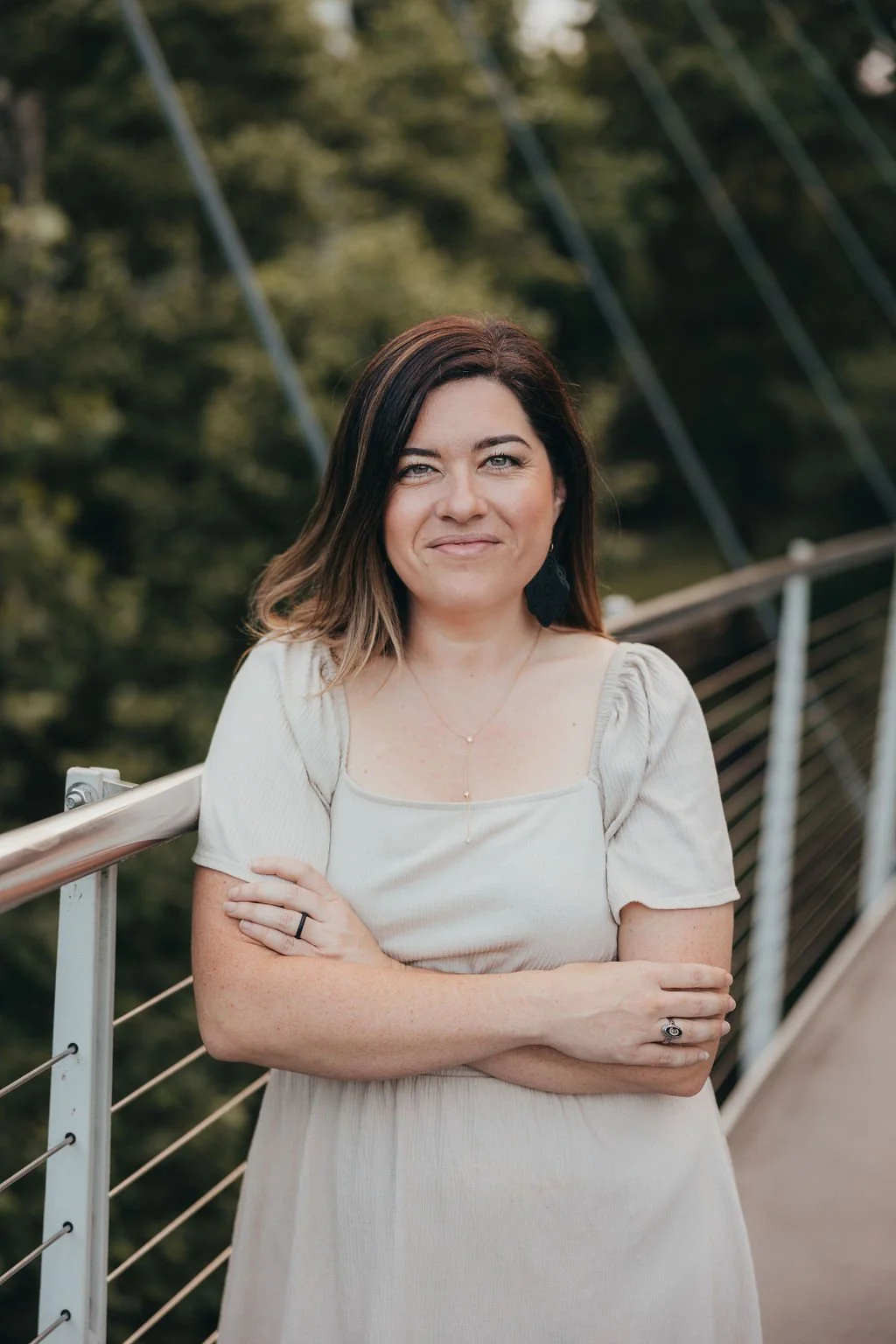 inviting therapist smiling in the park in Greenville, SC