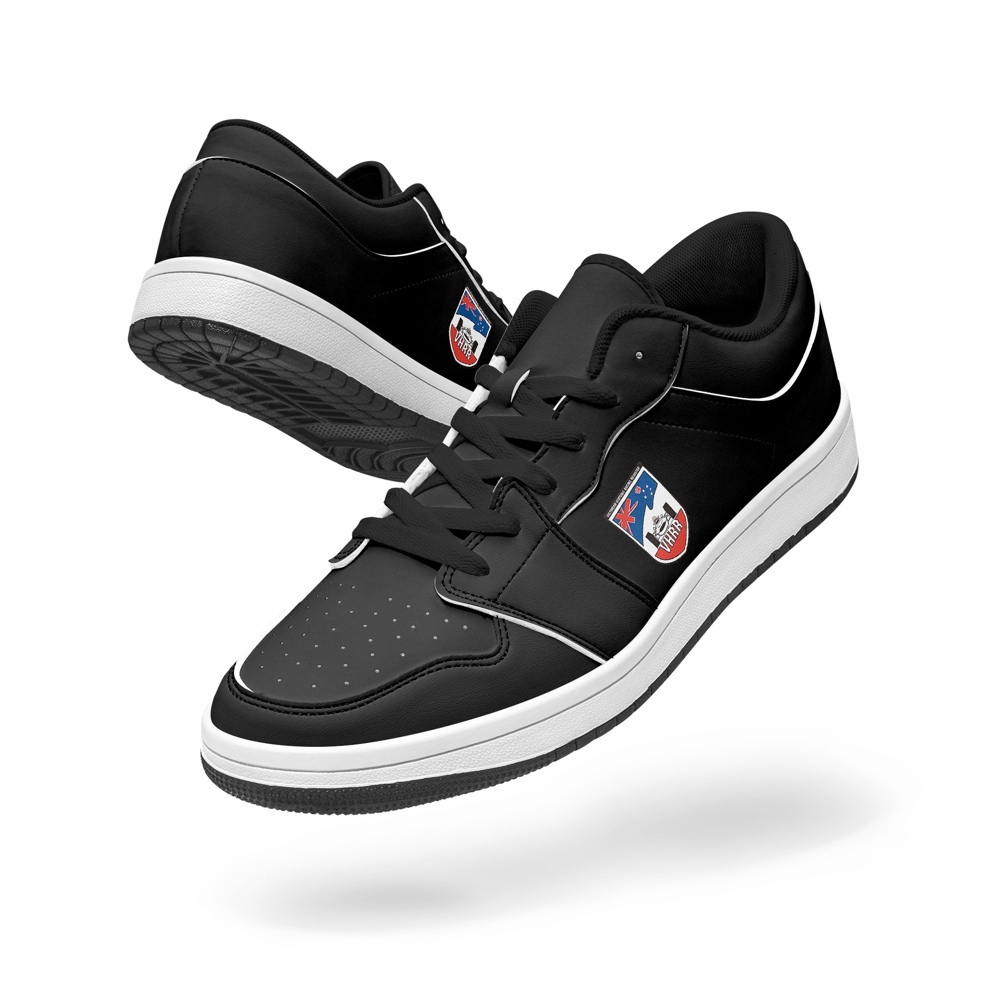Pair of black and white sneakers with international flags and emblem on the sides.