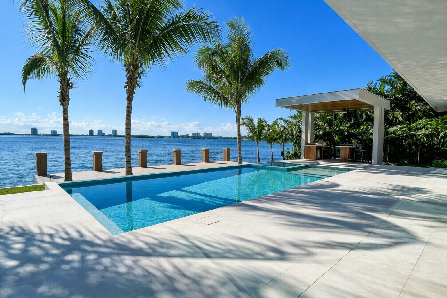 Luxury outdoor pool area overlooking bay