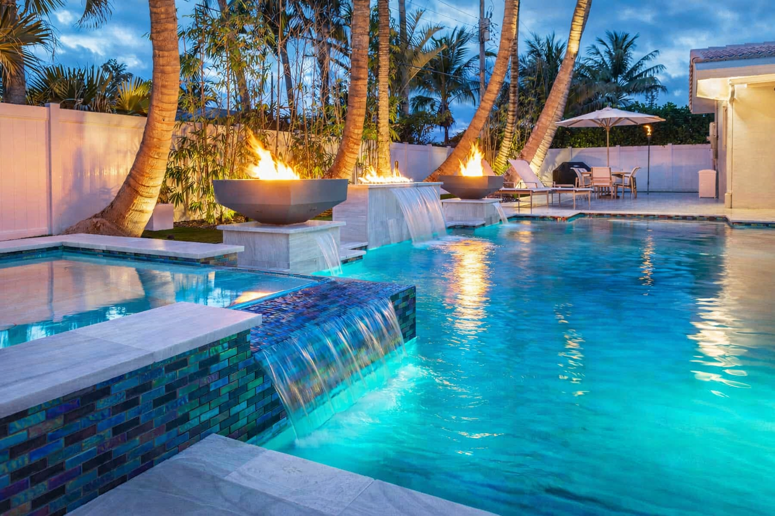 Glass walls surrounded by swimming pool