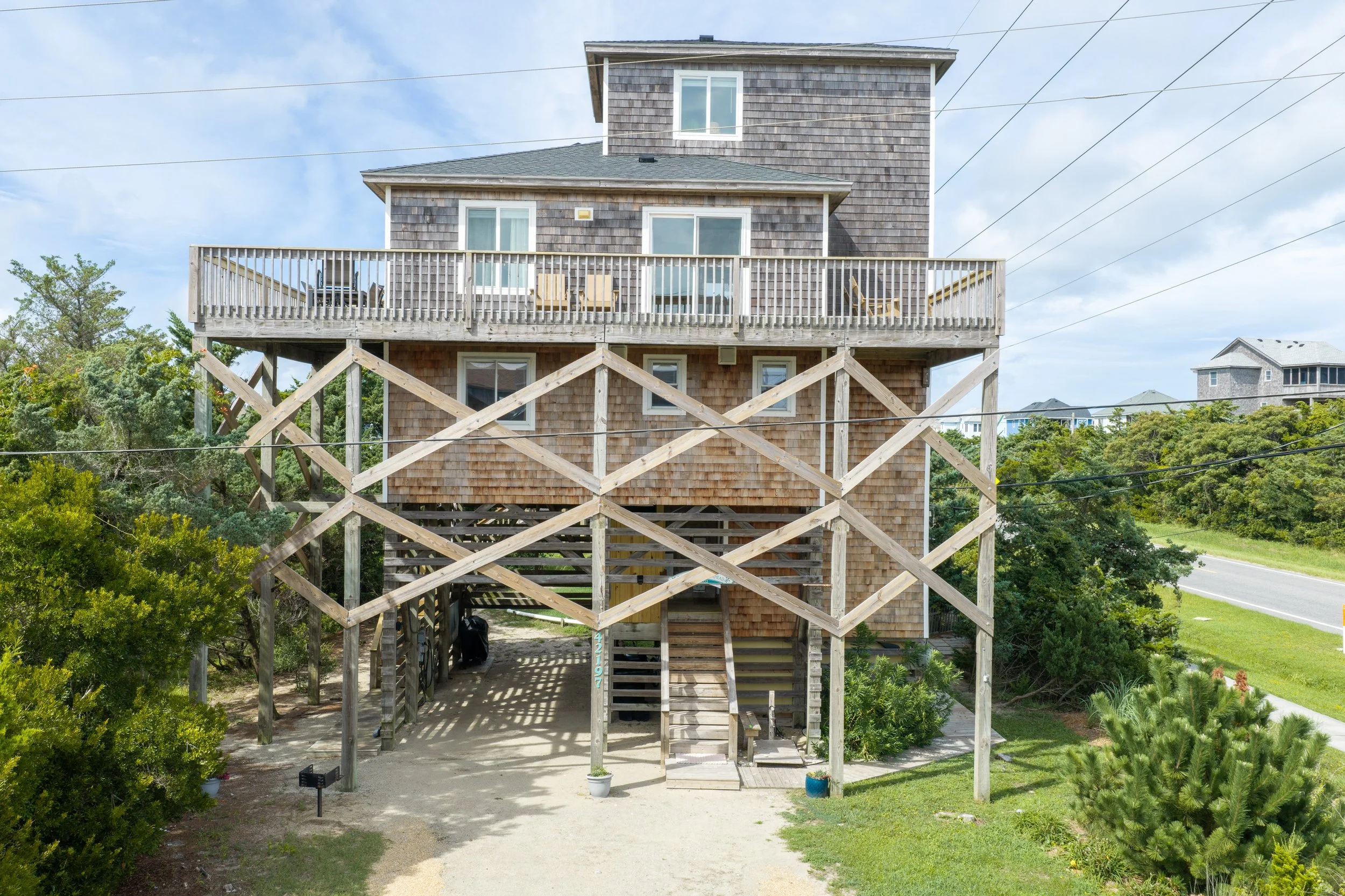 Cedar Outer Banks house on tall pilings with X-brace framing