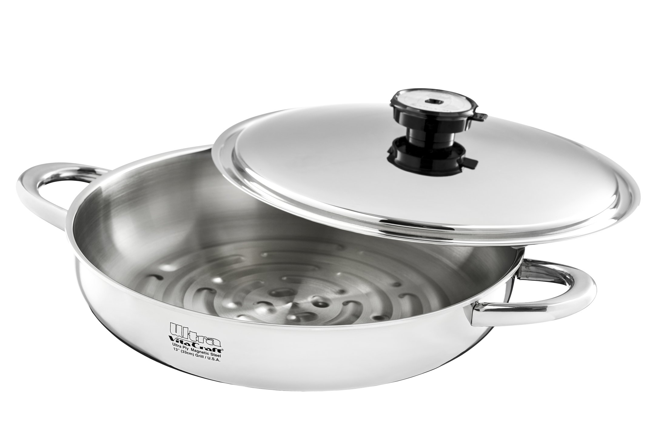 A stainless steel grill with a lid, handle, and temperature control on top, labeled Vitrecraf Ultra-Ply Magnetic Steel, 13 inches in diameter. Product Photography.
