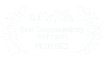 Award badge with laurel leaves, recognizing best student documentary nominee in 2022.