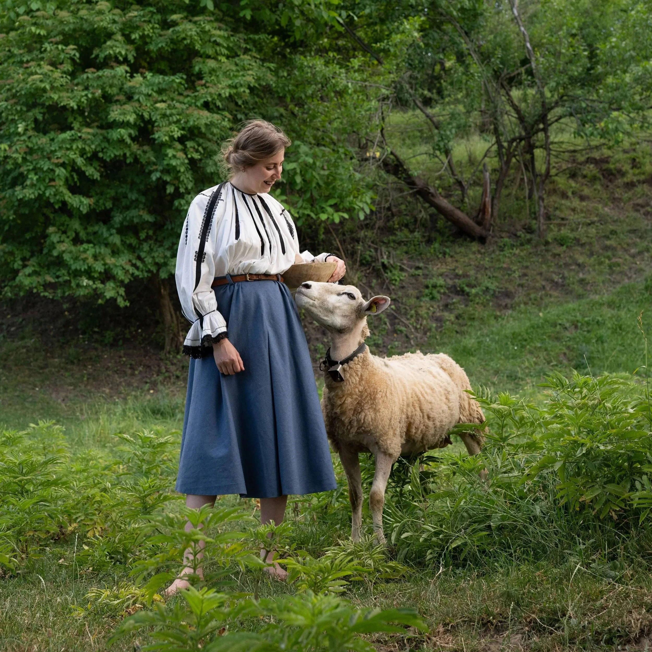 A touching moment between Sharon Schuster, daugher of Lavinia and Willy Schuster, and her sheep. She is working on her and her family's farms preserving the traditional Transylvanian agriculture and the Saxon way of life. 