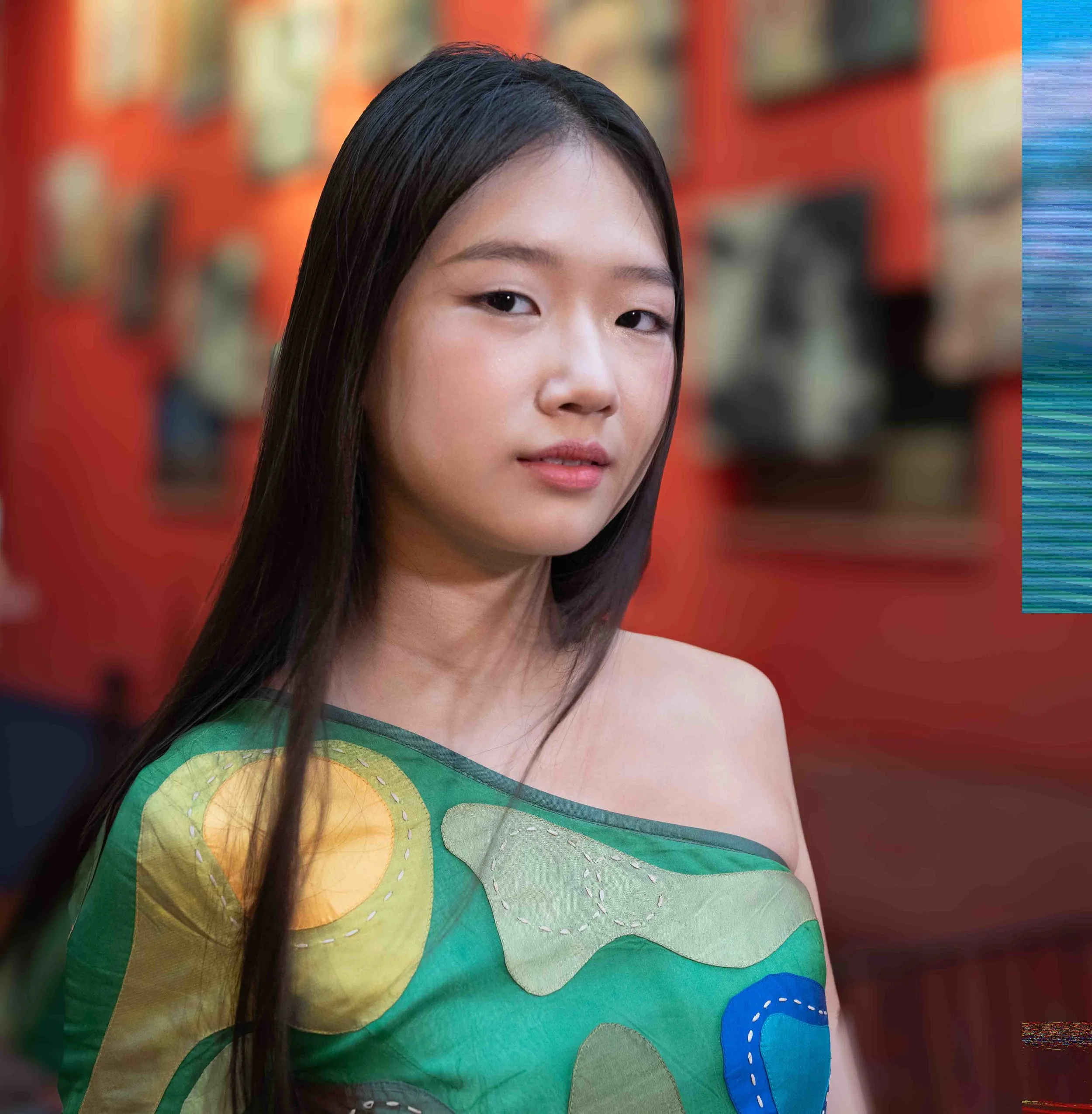 This young model was being mentored by more senior models.  She often looked uncomfortable in the role, but appeared naturally elegant and confident in this photo.