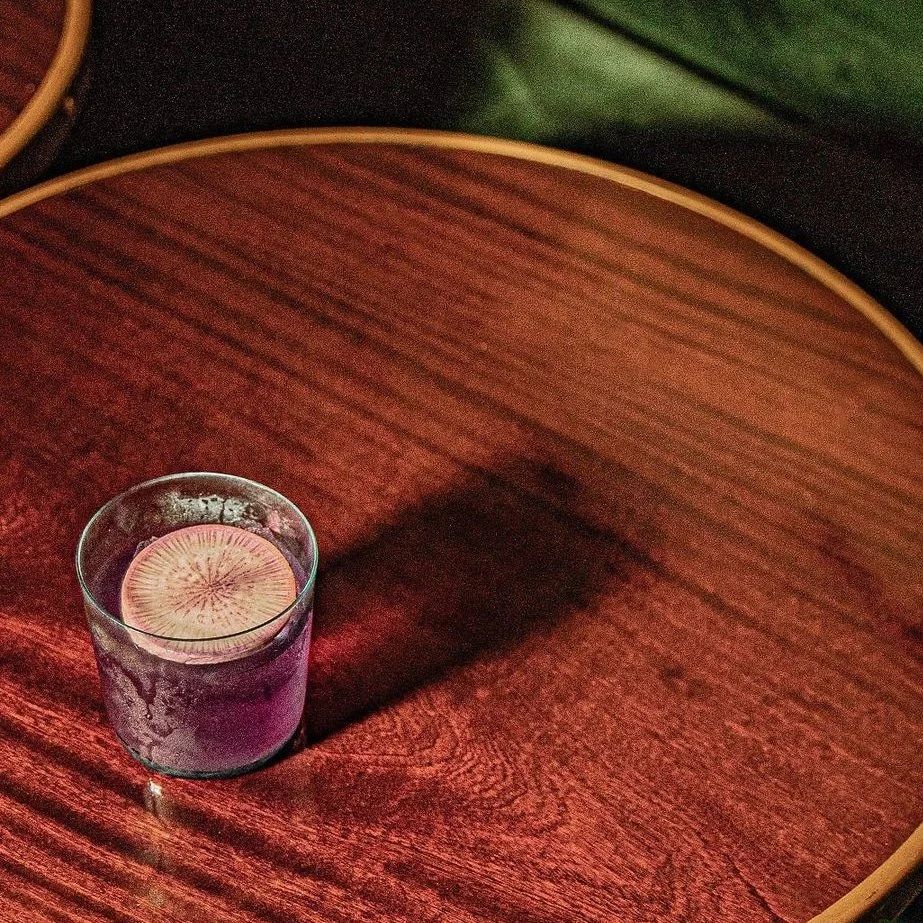 Contemporary author cocktail with radish garnish, showcasing David Paz’s refined mixology style for high-end bars and hospitality experiences.