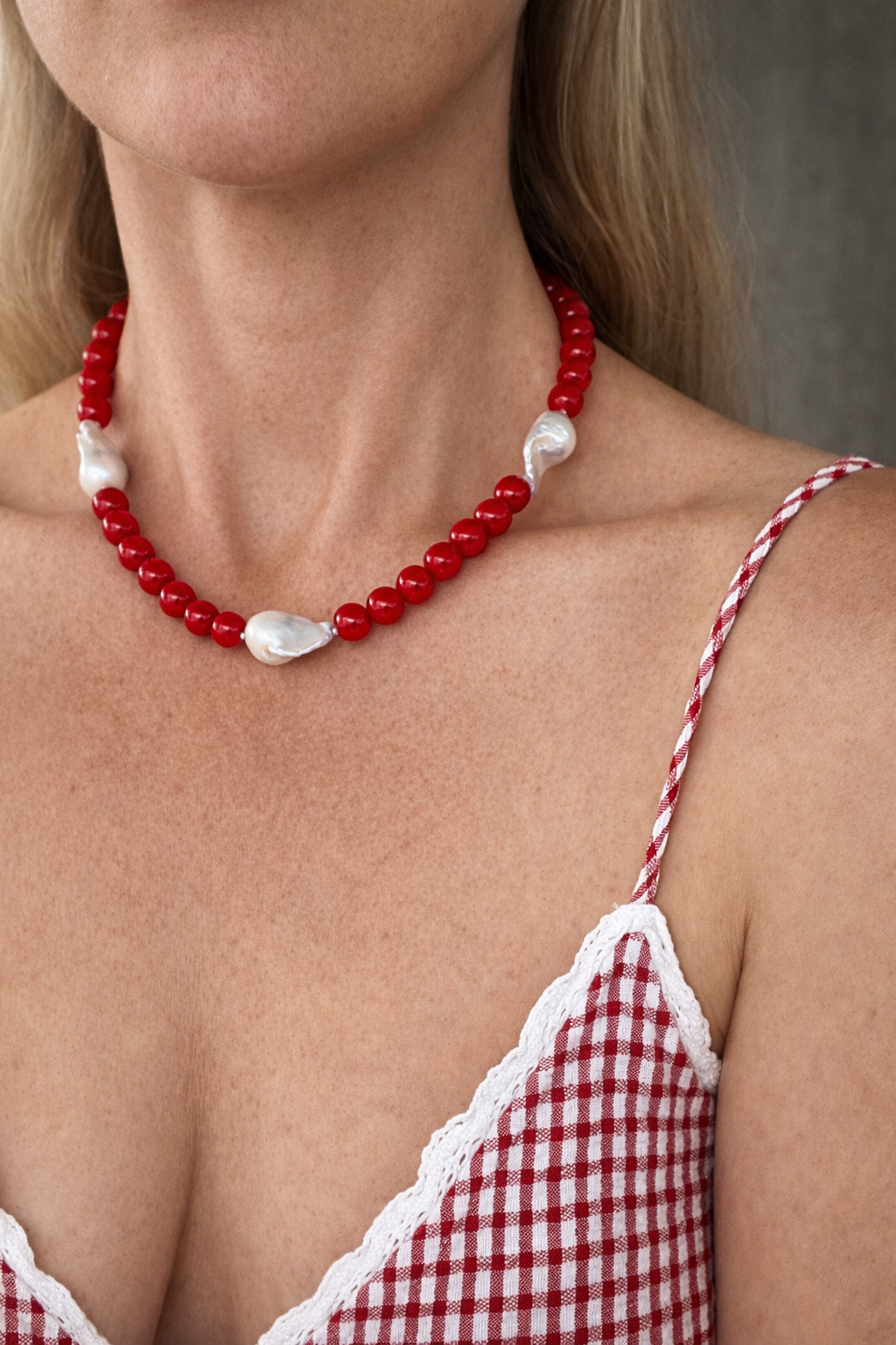 Trio necklace on model.png